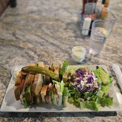 Club sandwich on sourdough with side salad. The turkey was soft and moist, bacon was crispy and the salad was fresh!!