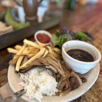 Sol Food - Sliced steak, fries, rice, black beans, sautéed onions.... - Puerto Rican Near Me - San Rafael, California Sol Food - Sliced steak, fries, rice, black beans, sautéed onions.... - Puerto Rican Near Me - San Rafael, California