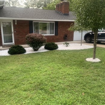 ENVY Pristine Landscapes - the front yard of a house - Lawn Services Near Me