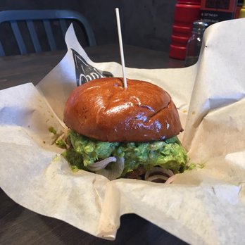 The Stand - American Classics Redefined - El Capitan has a patty, short rib, onion, guacamole and chimichurri on brioche! My first burger with a bun in years! So good! - New American Near Me - Irvine, California The Stand - American Classics Redefined - El Capitan has a patty, short rib, onion, guacamole and chimichurri on brioche! My first burger with a bun in years! So good! - New American Near Me - Irvine, California