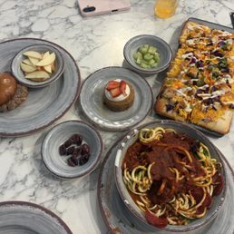 Buffalo Chickpea flatbread, Banana cake, and zucchini spaghetti Buffalo Chickpea flatbread, Banana cake, and zucchini spaghetti