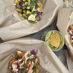 Rockfish taco, carnita taco, and peep guac and chips!