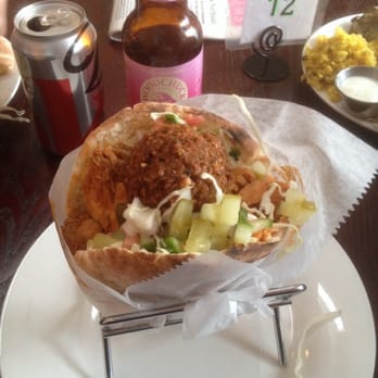 Banzo - F-bomb in a pita went well with the cider in the background! - Mediterranean Near Me - Madison, Wisconsin