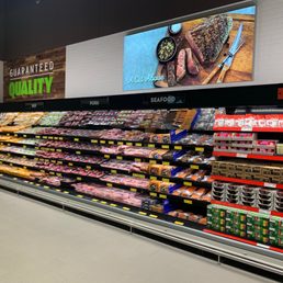 a display of meat in a grocery store