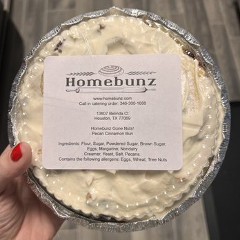 Homebunz - a person holding a pie with frosting - Bakeries Near Me Homebunz - a person holding a pie with frosting - Bakeries Near Me
