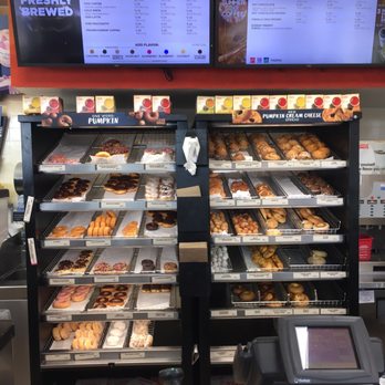 Dunkin' -  a display of doughnuts and pastries - Coffee & Tea Near Me - Niles, Illinois
