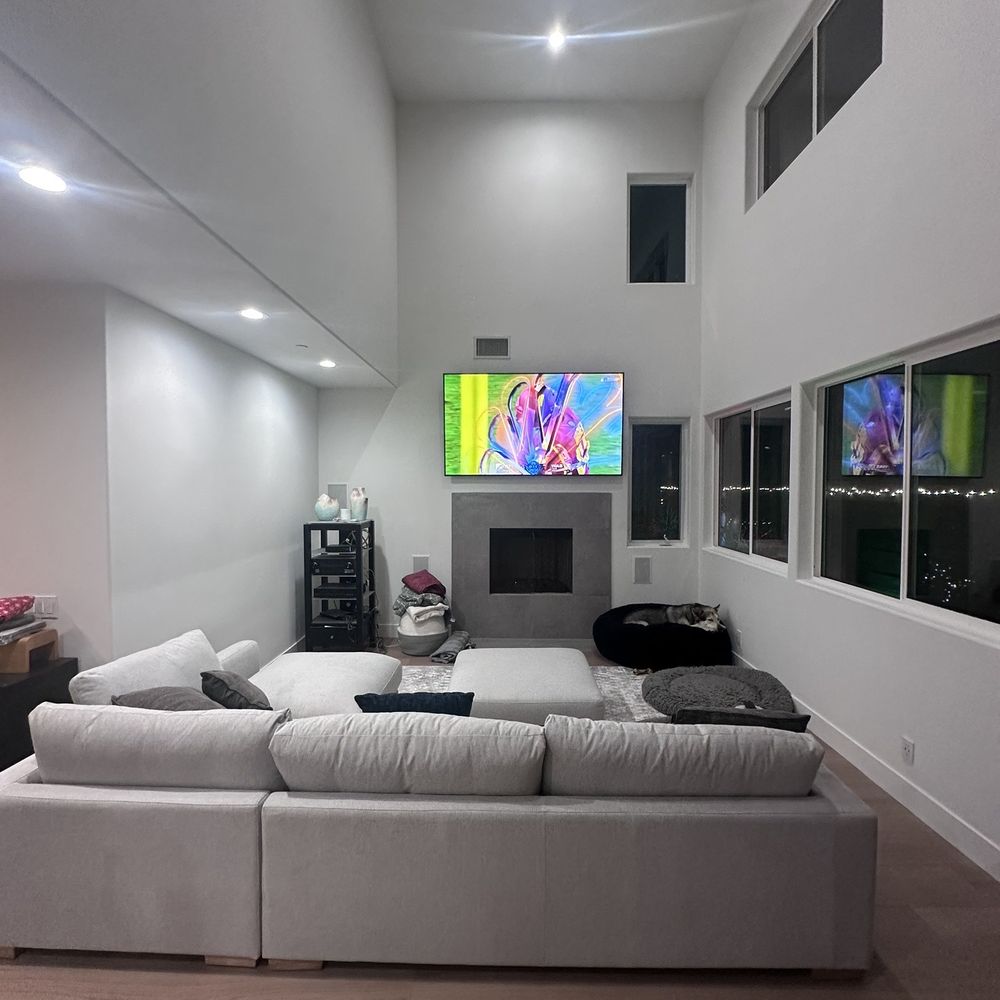 Lux Kitchen and Bath Remodeling - View into our living room.  Shawna helped us pick out our new fireplace surround.  It is sleek and beautiful. - General Contractors Near Me - Irvine, California