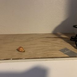 Country Inn & Suites by Radisson, Sidney, NE - Peach pit? Left in the room?
