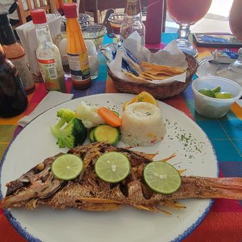 Mariscos Cisneros - Fried fish (guanchinango on the menu) and shrimp cocktail. - Mexican Near Me - Puerto Vallarta, JAL Mariscos Cisneros - Fried fish (guanchinango on the menu) and shrimp cocktail. - Mexican Near Me - Puerto Vallarta, JAL