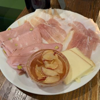 Augustine's Salumeria - Salumeria served with Cacio e Peppe Zeppole and Mostarda - Italian Near Me - Mamaroneck, New York
