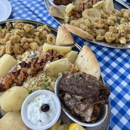 Greek Platter. Calamari was okay. Greek Platter. Calamari was okay.