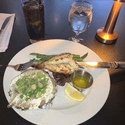 Ralph's Texas Bar & Steak House - 8oz. Steak and Lobster Tail with Baked and Asparagus. Excellent quality and preparation.