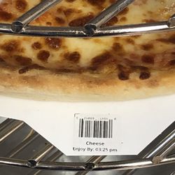 Casey's - Cheese Pizza twenty minutes past "Enjoy By" time. Am I expected to pay for fresh and get tough?