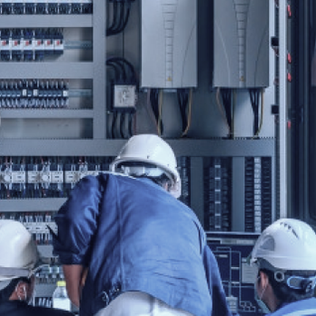 Tristate Central Services - a group of workers working on a large electrical panel - General Contractors Near Me - White Plains, New York Tristate Central Services - a group of workers working on a large electrical panel - General Contractors Near Me - White Plains, New York