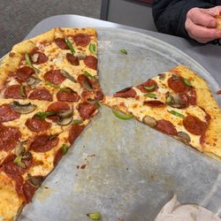 Chuck E. Cheese - $32 for a xtra large and 3 toppings