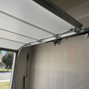 R & E Garage Doors - New racks and rollers - Garage Door Services Near Me R & E Garage Doors - New racks and rollers - Garage Door Services Near Me