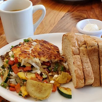 Moke’s Bread And Breakfast - Vegetable frittata in stuffed hash brown with toast - Breakfast & Brunch Near Me - Honolulu, Hawaii Moke’s Bread And Breakfast - Vegetable frittata in stuffed hash brown with toast - Breakfast & Brunch Near Me - Honolulu, Hawaii
