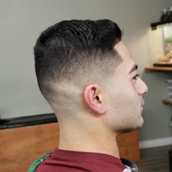 Medina's Barber Shop - Ask Isaiah for a bald fade.