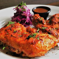 The Grill Eastham - HALF FRANGO - Tender grilled half chicken marinated in our very own secret recipe served with a sauce of your choice