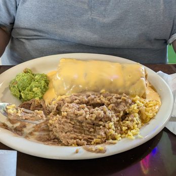 El Jalisciense Mexican Restaurant - My husband mixed his rice and beans before I could get a picture! This is the Chimichanga plate. He finished it, nuff said. - Mexican Near Me - Deer Park, Texas