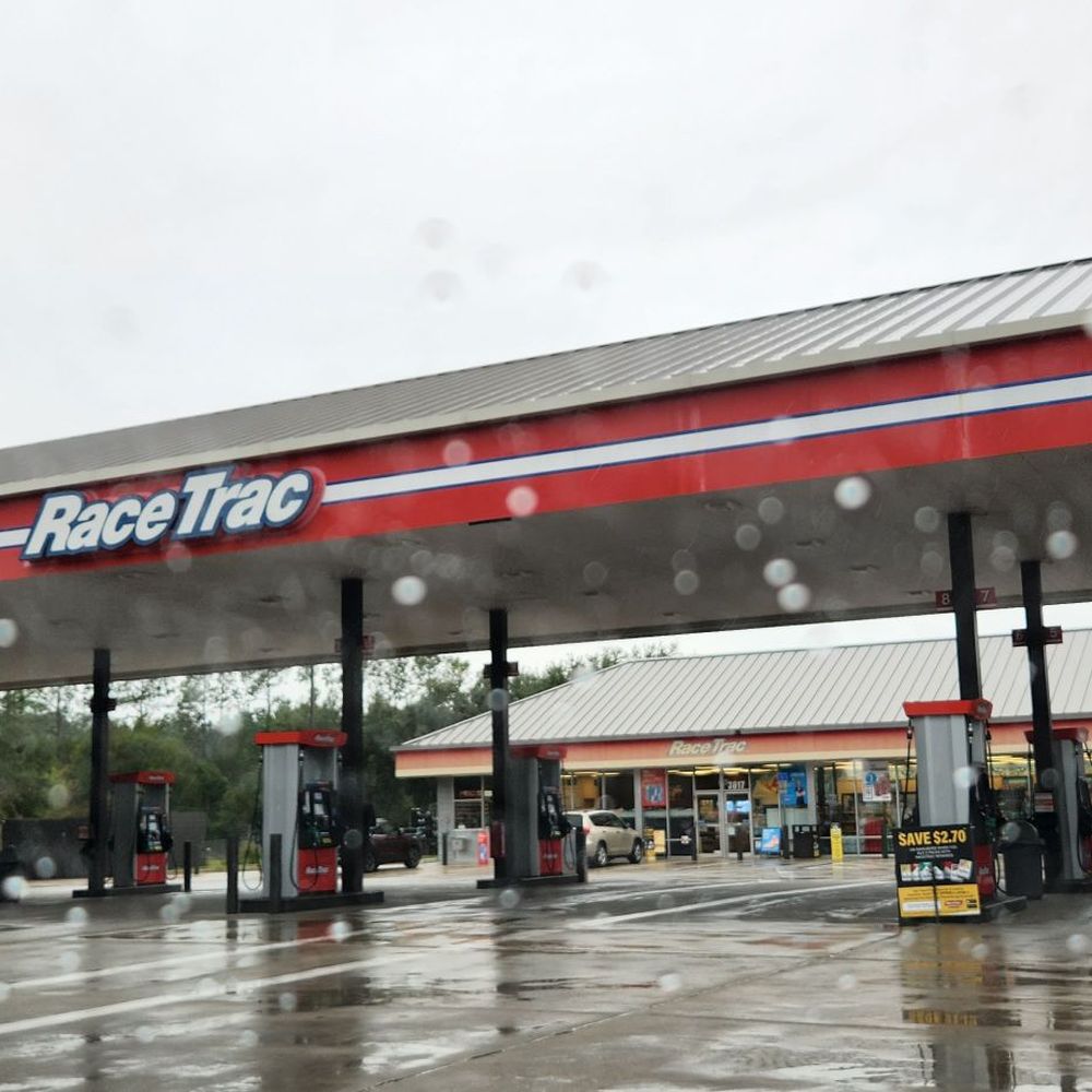 a gas station in the rain a gas station in the rain