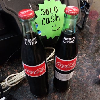 La Morenita Market - two coke bottles with a sold sign - Mexican Near Me - Concord, California La Morenita Market - two coke bottles with a sold sign - Mexican Near Me - Concord, California