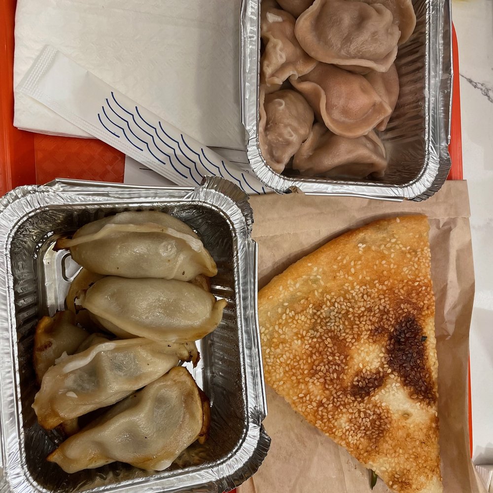Vanessa’s Dumpling House - three trays of food - Chinese Near Me - New York, New York Vanessa’s Dumpling House - three trays of food - Chinese Near Me - New York, New York
