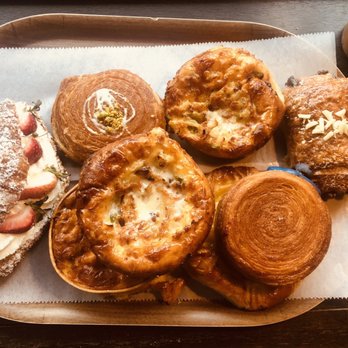 Chateau De Chantilly Cafe - Strawberry whipped cream croissant, bacon and cheese quiche, blueberry roll - Bakeries Near Me - Chantilly, Virginia