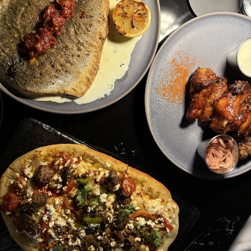 Amina - Beef flatbread, branzino and wings - Mediterranean Near Me - Charlotte, North Carolina