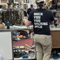 Gibson's Tactical Tavern - Gibson in the store taking care of business.