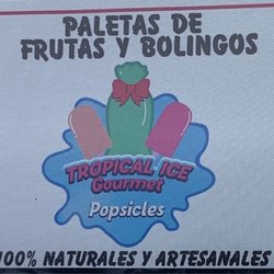 Tropical Ice Gourmet - Sign on food truck. Fruit popsicles and "bolingos", which are icy snacks. 100% Natural and Artisinal.