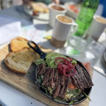 Outpost Kitchen - Raging Bull Skillet and a flat white coffee. So good! - Breakfast & Brunch Near Me - Costa Mesa, California