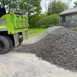 Foote Excavating - We deliver most stone products and top soil or soil and clay mix for fill we also grade out any of the products we deliver to you as well