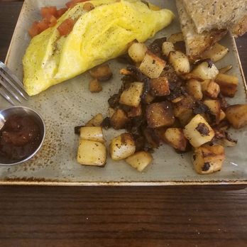 First Watch - An omelete you can see some almost burnt potatoes - Breakfast & Brunch Near Me - Schaumburg, Illinois First Watch - An omelete you can see some almost burnt potatoes - Breakfast & Brunch Near Me - Schaumburg, Illinois