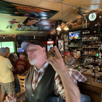 Tom's Tavern - a man making a peace sign - Dive Bars Near Me - Howell, New Jersey
