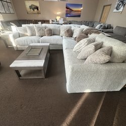 Quality Bedding And Furniture - Modular Sectional with accent pillows available at Quality Bedding and Furniture
