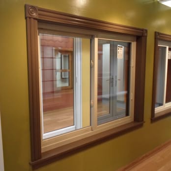 Creative Exteriors - a hallway with three windows - General Contractors Near Me - Chicago, Illinois Creative Exteriors - a hallway with three windows - General Contractors Near Me - Chicago, Illinois