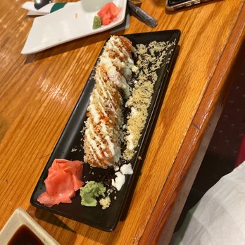 Okinawa - a plate of sushi on a wooden table - Japanese Near Me - Fort Walton Beach, Florida