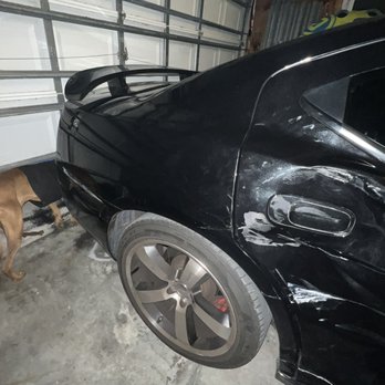 Trinity Auto Body Solutions - Red door painted to color match brilliant black and transferred everything mechanical wise over to new door in 3 days for $650 - Body Shops Near Me - Cape Coral, Florida