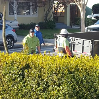 California Aqua Pros - two men working in a residential area - Pool & Hot Tub Service Near Me