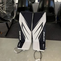 Wesco Sports Center - Brand new Bauer senior X5 goalie pads in Navy Blue