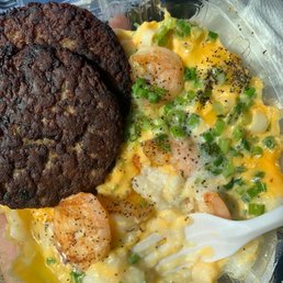 This is what I order if you want it to look like this: grits, 3 slices cheese add green onion & shrimp, pork sausage .