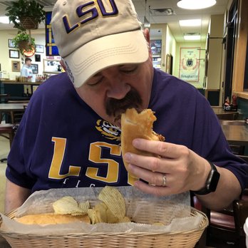 Chris' Poboys - Hubby loving his REAL roast beef po'boy ... no lunch meat on this one! - Sandwiches Near Me - Lafayette, Louisiana Chris' Poboys - Hubby loving his REAL roast beef po'boy ... no lunch meat on this one! - Sandwiches Near Me - Lafayette, Louisiana