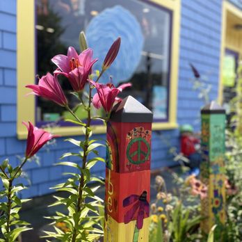 Abiyoyo - Garden in front of Abiyoyo. Lovely flowers and "peace poles." - Toy Stores Near Me - Wellfleet, Massachusetts