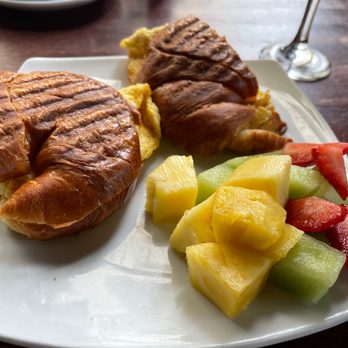 Teavolve - Crab & egg croissant sandwich with fruit - Coffee & Tea Near Me - Baltimore, Maryland