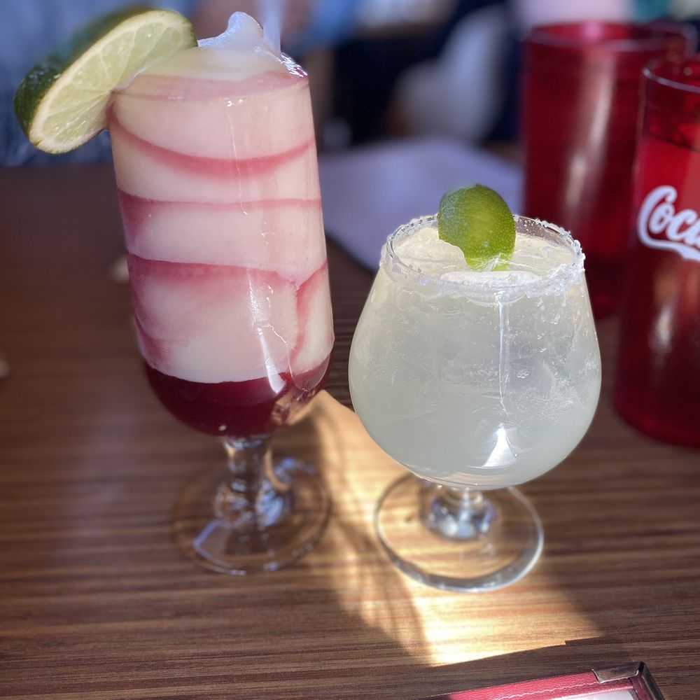 Tomasita's - The swirl (frozen margarita with sangria) Silver coin - New Mexican Cuisine Near Me - Santa Fe, New Mexico Tomasita's - The swirl (frozen margarita with sangria) Silver coin - New Mexican Cuisine Near Me - Santa Fe, New Mexico