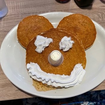 The Green Apple - a plate with pancakes and whipped cream - Cafes Near Me - Waterloo, New York