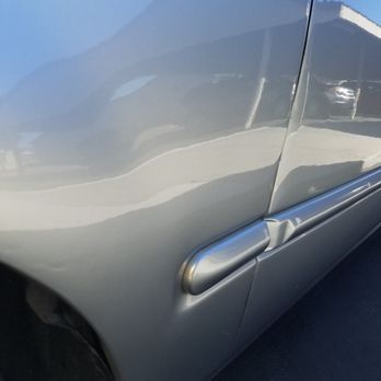 Dent Pro Mobile - After the work was done on drivers side fender picture angle facing the rear of the car - Body Shops Near Me Dent Pro Mobile - After the work was done on drivers side fender picture angle facing the rear of the car - Body Shops Near Me