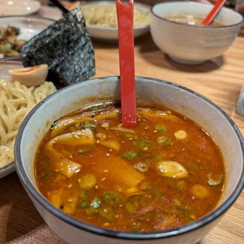 Rudy’s Ramen - Spicy tsukemen broth (char siu pork is under the surface) - Ramen Near Me - Chicago, Illinois