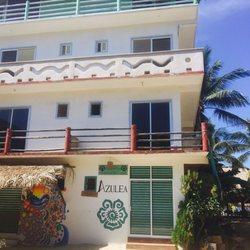Azulea - Beautiful building with a palapa rooftop ;)